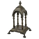 A BRONZE SHRINE, WESTERN INDIA, 19TH CENTURY cast brass, in the form of a columnar pavilion, the