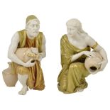 A PAIR OF ROYAL WORCESTER KNEELING WATER CARRIER FIGURES, 1911/12 modelled by James Hadley (1837-