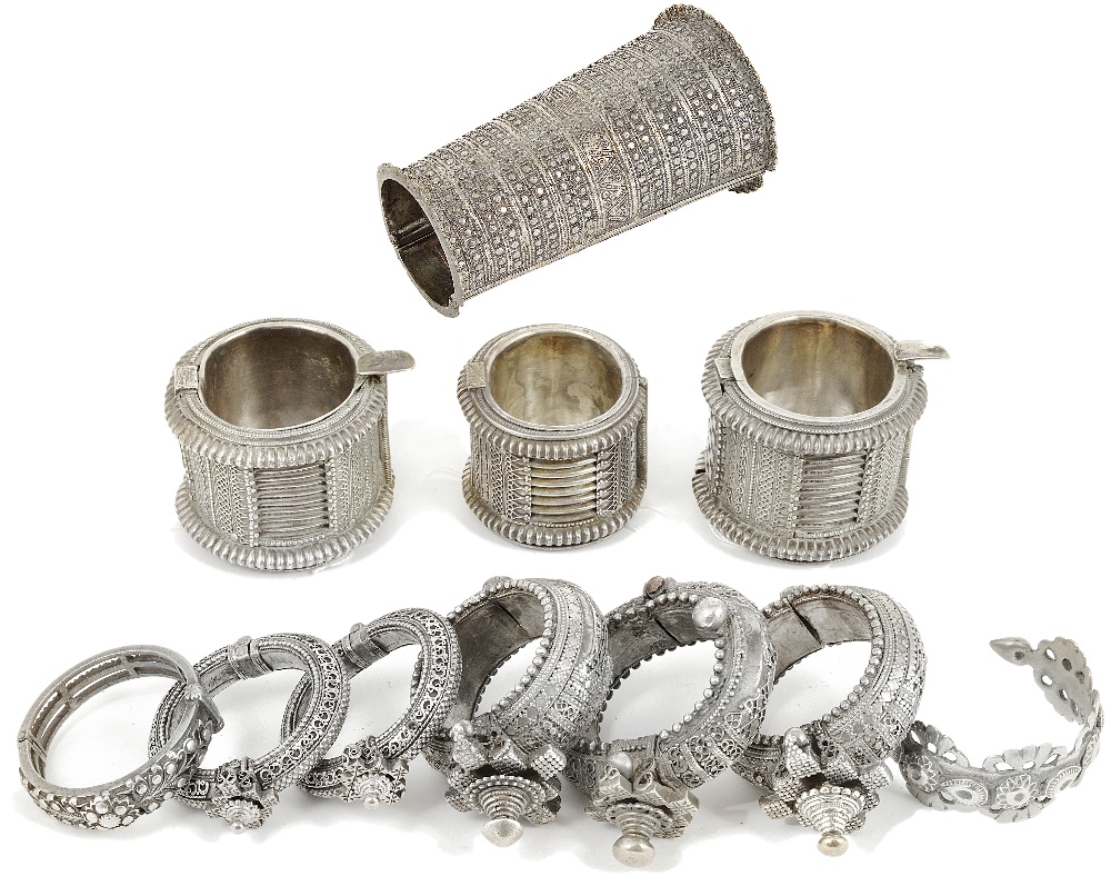 TWELVE SILVER AND SILVER ALLOY TRIBAL BRACELETS, RAJASTHAN, WESTERN INDIA, 19TH/20TH CENTURY all but