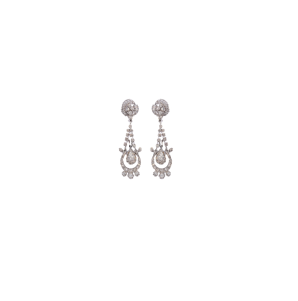 PAIR OF DIAMOND PENDENT EARRINGS each surmount designed as a graduated swirl set with baguette