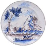 A FAIENCE PLATE, FRENCH, LATE 19TH / EARLY 20TH CENTURY in 17th century Nevers style, painted in