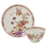 A MEISSEN TEABOWL AND SAUCER, CIRCA 1730-35 painted with chinoiserie flowers within a band of iron-