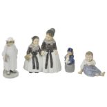 A COLLECTION OF FOUR ROYAL COPENHAGEN FIGURES, EARLY TO MID 20TH CENTURY comprising: Amager Girls