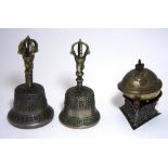 A COLLECTION OF RITUAL OBJECTS, TIBET, 19TH-20TH CENTURIES comprising four damaru, two pairs of