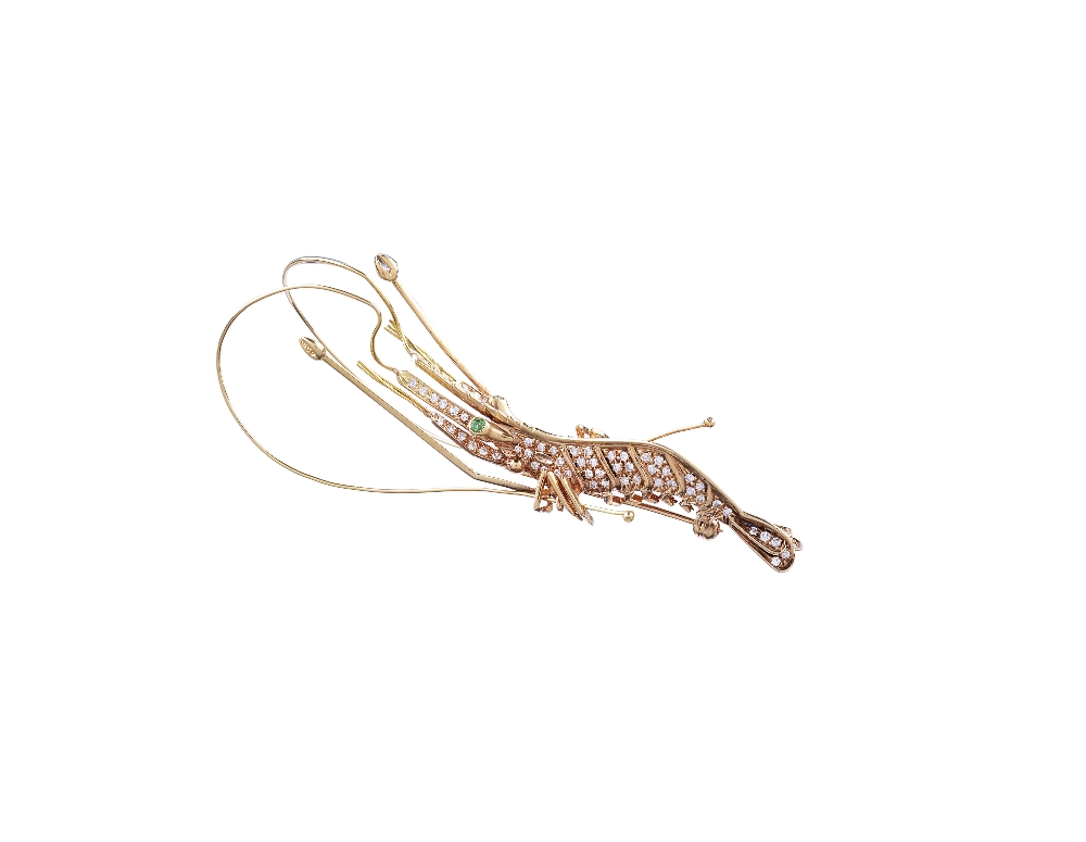 DIAMOND AND EMERALD BROOCH designed as a prawn, set throughout with brilliant-cut diamonds with