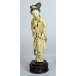 A Chinese Carved Ivory Guanyin Figure