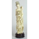 A Chinese Carved Ivory Guanyin Figure