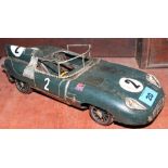 A tinplate model of a Jaguar racing car