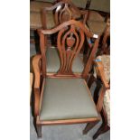 A pair of Sheraton style carver chairs