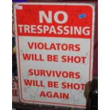 A tin sign 'No Trespassing'