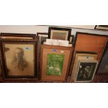 A large collection of prints and frames
