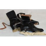 A pair of Harrods leather ice skates with trees