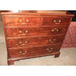 A George III mahogany chest, the moulded top over two short and three long drawers on bracket feet.