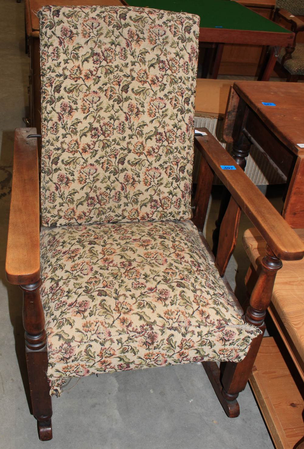 A 1930s reclining chair and a pine Pembroke table