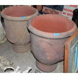 Two terracotta urns