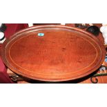 An Edwardian mahogany inlaid oval gallery tray. 26 ½" wide over handles