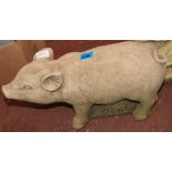 A statuary pig figure