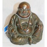 A bronze figure of the seated Buddha. 4 ¼" high