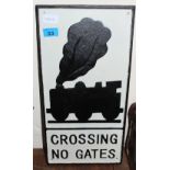 A metal sign 'Crossing No Gates'