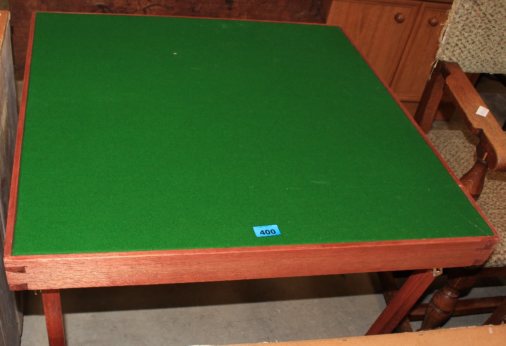 A baize topped card table