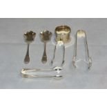 Silver smallware to include a napkin ring, two sugar bows and a pair of jam spoons, 3ozs 10dwts;