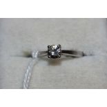 A diamond solitaire ring, the stone 0.5ct. In gold marked 750. Size K