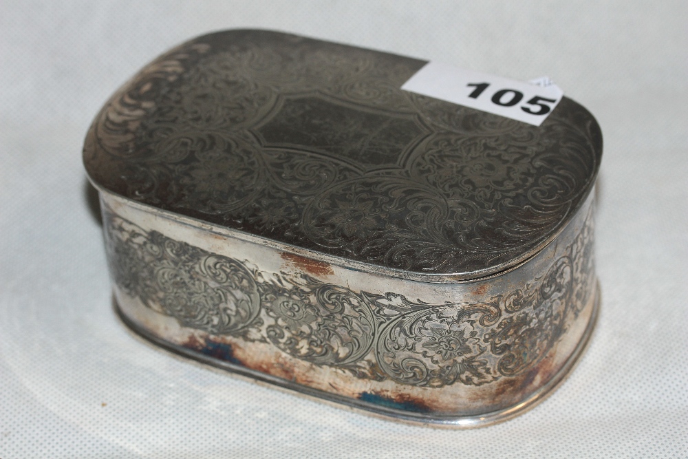 An American plated trinket box, chased with meandering foliage, silk lined interior. 5" wide