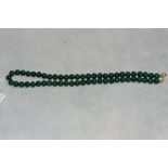 A necklace of malachite beads