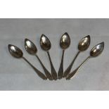 An Elizabeth II set of six silver grapefruit spoons. Sheffield 1956. 4oz 10dwts