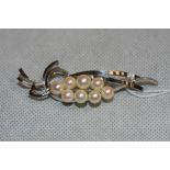 A silver and cultured pearl brooch