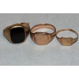 Three 9ct signet rings. 10.7g gross