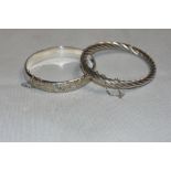 Two silver hinged bangles