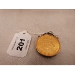 A gold twenty dollar coin. 1904 in 9ct pendant mount. 36g gross