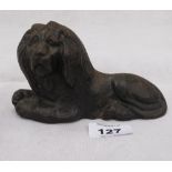 A 19th century cast iron lion doorstop. 6'' long