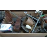 A box of wood and metalware