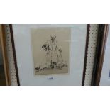 An etching. Terriers and handler. Indistinctly signed. 10'' x 8''