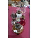 Four oil lamps