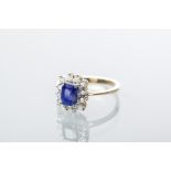 SAPPHIRE AND DIAMOND CLUSTER RING