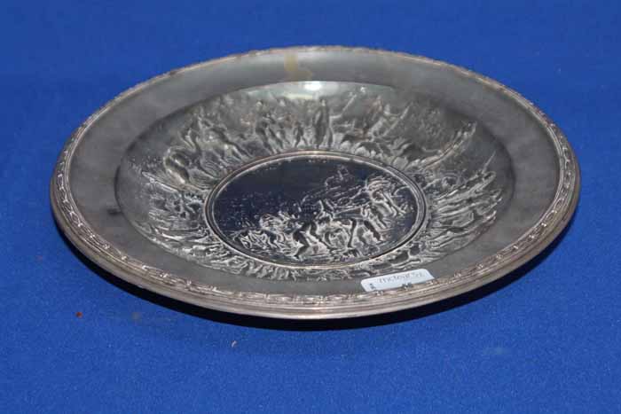 LATE 19TH CENTURY SILVER PLATED CHARGER IN THE MANNER OF ELKINGTON
embossed with an elabroate scene