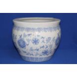 BLUE AND WHITE JARDINIERE
decorated with stylised floral and foliate motifs,