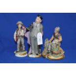 GROUP OF FOUR CAPODIMONTE FIGURES
including a Professor, a country boy,