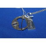 SILVER INGOT PENDANT AND CHAIN 
and a Scottish silver brooch of antique design (2)