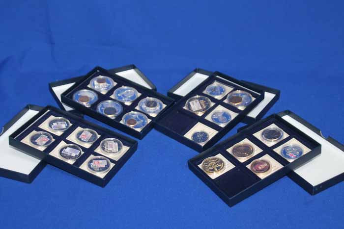 LOT OF COMMEMORATIVE COINS IN CASES
22 examples and 20 with certificates of authenticity,