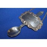 EARLY GEORG JENSEN SILVER PYRAMID PATTERN TEASPOON
together with a pressed silver sherry decanter