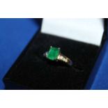 EMERALD AND GOLD RING
marked nine carat,