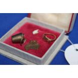 THREE NINE CARAT GOLD CHARMS
comprising of a bucket,