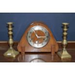 WALNUT MANTEL CLOCK 
together with a pair of brass candlesticks