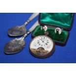 PAIR OF MOTHER OF PEARL HANDLED SILVER PRESERVE SPOONS
together with a Continental pocket watch and