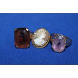 TWO GOLD DRESS RINGS
including a citrine set example and a light amethyst example;