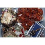 LOT OF COSTUME JEWELLERY
including amber and horn beads, necklaces, beads, silver filigree, rings,